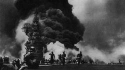 The USS Bunker Hill is hit for the second time in 30 minutes by a Kamikaze. 