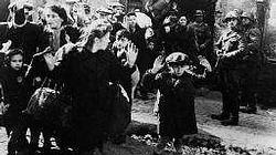 Women and children being cleared out of the Warsaw ghetto by the SS, ready for transport to Auschwitz.