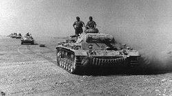 An Afrika Korps armoured column heads up to the front in late March 1941.