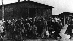 The Allies liberated Belsen Concentration Camp. Women, some still wearing their striped uniforms, prepare to leave.