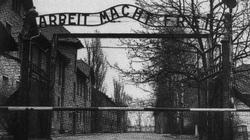 The entrance to Auschwitz concentration camp. The sign 'Arbeit Macht Frei' reads as 'Work Makes You Free'.