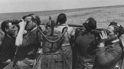 Lookouts on a U-boat scan the horizon for potential victims or Allied long-range anti-submarine aircraft.