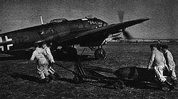 Arming of a He-111 takes place ready for a raid against England in early 1942.